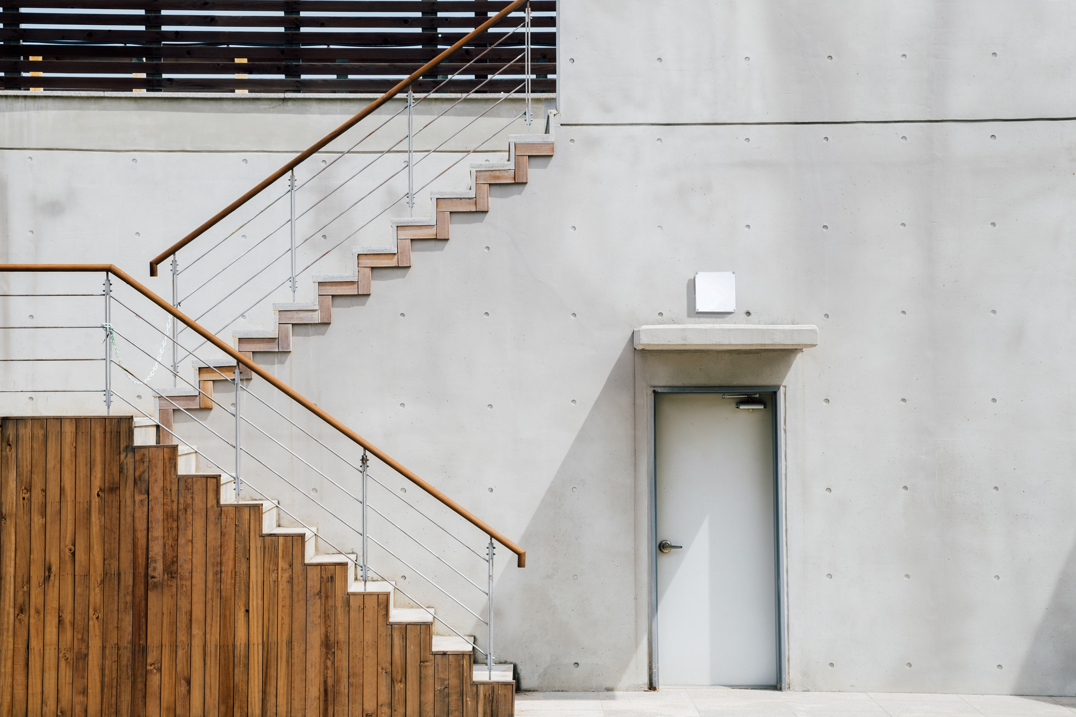 The G<span style="font-variant: small-caps;">uard</span>1 FacilityWatch Device above a doorway.